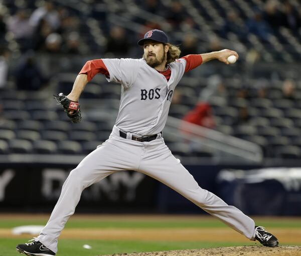 Boston Red Sox relief pitcher Andrew Miller (30) in a baseball game at Yankee Stadium in New York, Wednesday, April 3, 2013. (AP Photo/Kathy Willens) The Braves hope to add a lefty reliever before the trade deadline, and 6-foot-7 Red Sox lefty Andrew Miller is among those they've scouted. (AP photo)