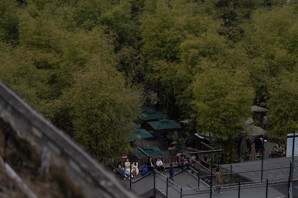 Visitors enjoy the bamboo forest at the West Village project by Pritzker Architecture Prize winner Chinese architect Liu Jiakun in Chengdu in southwestern China's Sichuan province on Sunday, March 2, 2025. (AP Photo/Ng Han Guan)