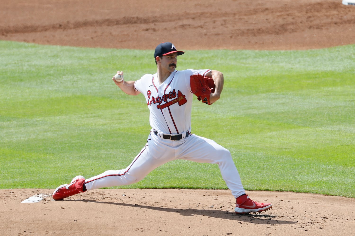 Braves starting pitcher Spencer Strider delivers during the first inning Sunday at Truist Park. (Miguel Martinez / miguel.martinezjimenez@ajc.com)