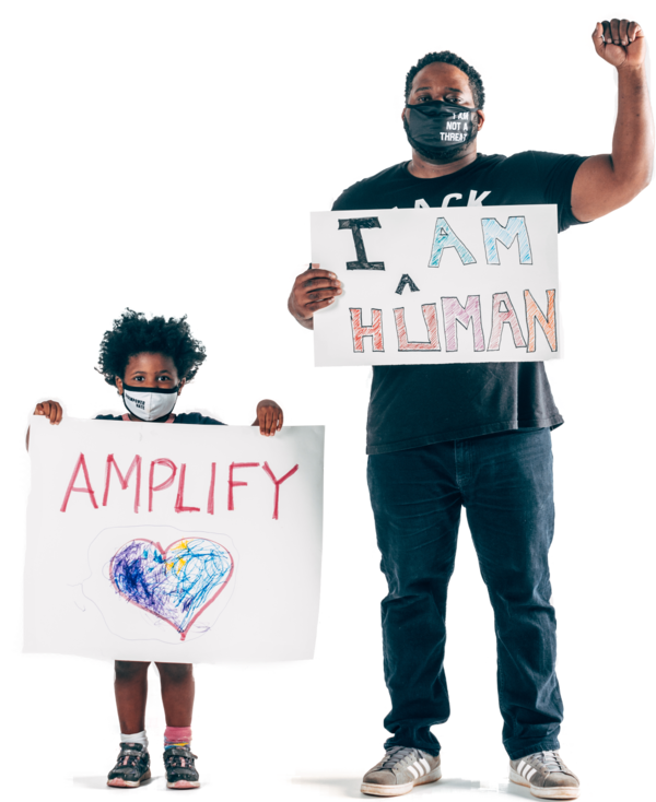 Khalil Thompson and daughter Syrai hold statements of solidarity for the family’s #AmplifyLove campaign.