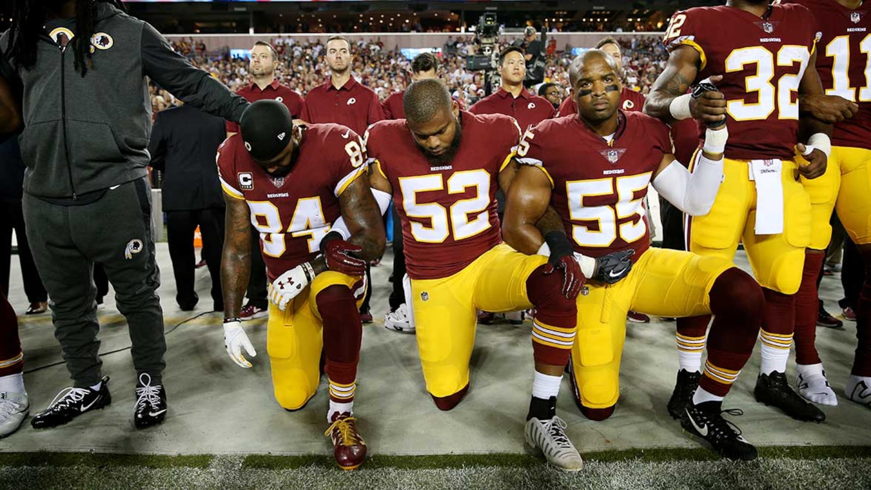 Photos: Falcons, other NFL teams show solidarity during National Anthem