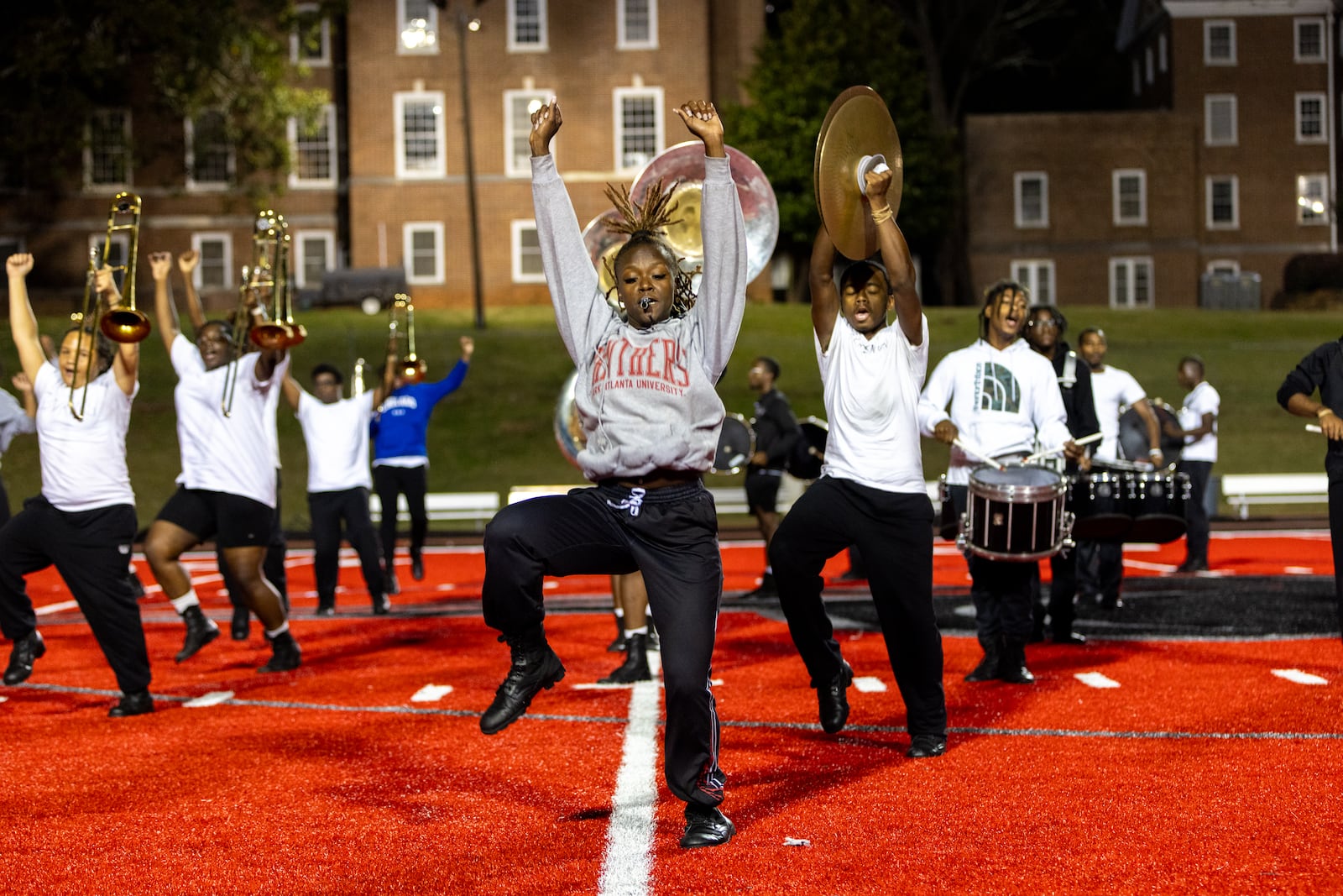 Ah’nyah Samuel, Clark Atlanta University’s first female drum major in seven years, practices with the Clark Atlanta University marching band at Panther Stadium at Clark Atlanta University in Atlanta on Thursday, October 10, 2024. (Arvin Temkar / AJC)