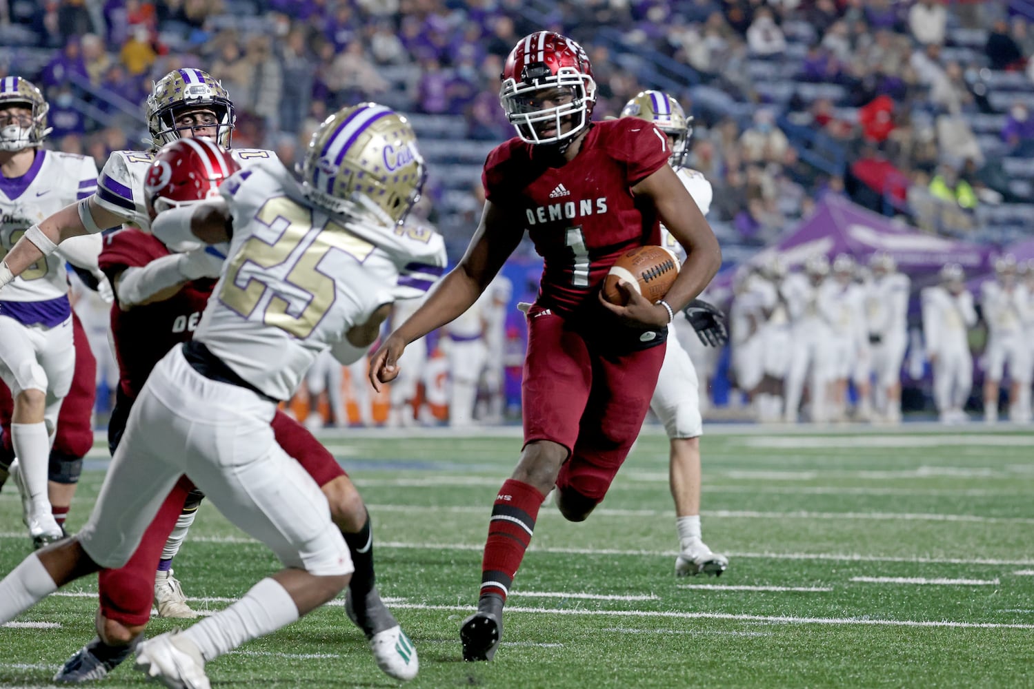 Warner Robins quarterback Jalen Addie (1) scores a rushing touchdown in the second half against Cartersville of the Class 5A state high school football final at Center Parc Stadium Wednesday, December 30, 2020 in Atlanta. Warner Robins won 62-28. JASON GETZ FOR THE ATLANTA JOURNAL-CONSTITUTION