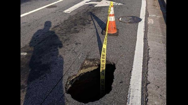 The right lanes State Bridge Road at Medlock Bridge Road will be "shut down for several days due to a sewer break that caused a sinkhole," Johns Creek police said Saturday morning. The sinkhole formed Friday.