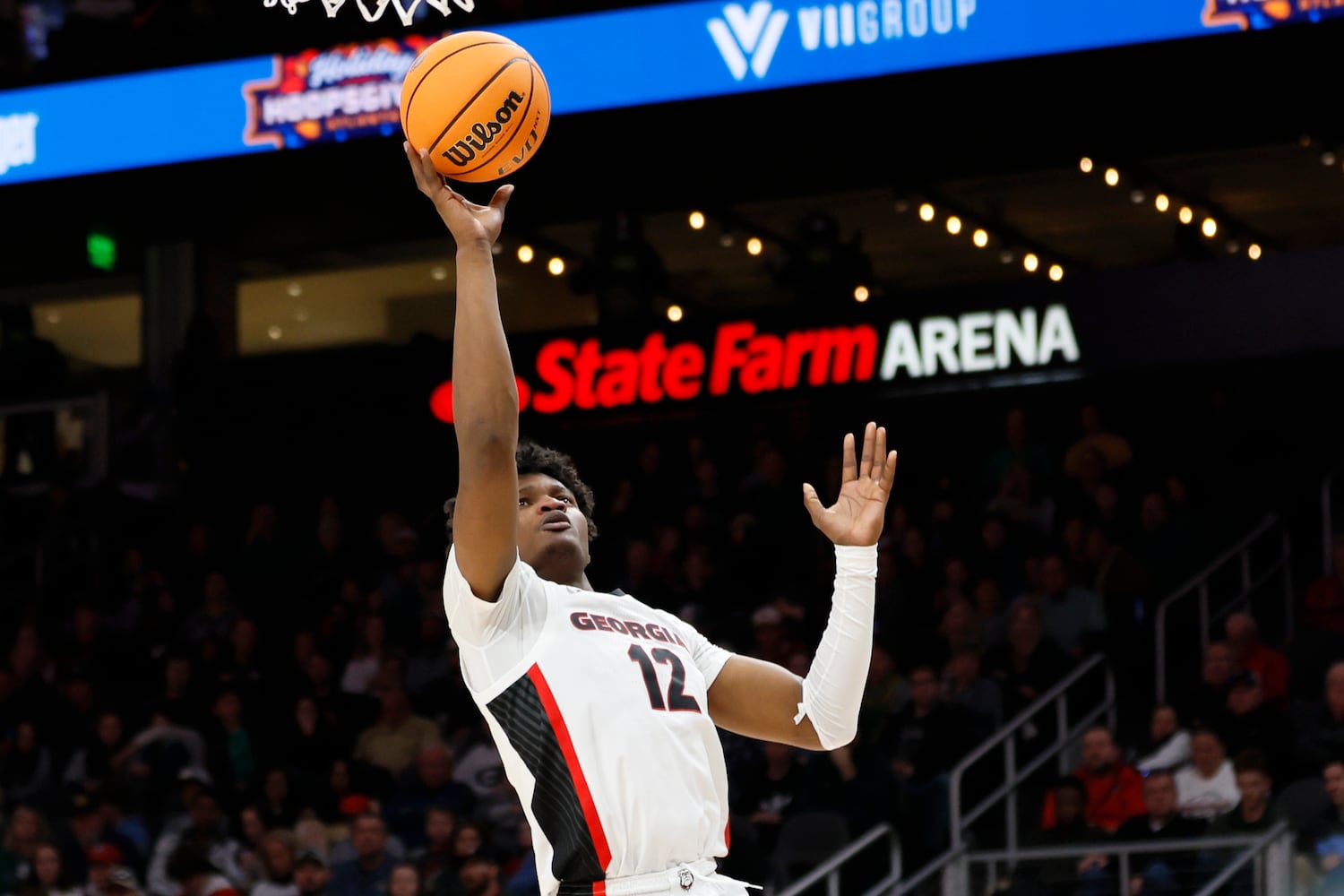 Bulldogs forward Matthew-Alexander Moncrieffe attempts a shot for the go-ahead basket during the second half Sunday night at State Farm Arena. (Miguel Martinez / miguel.martinezjimenez@ajc.com)