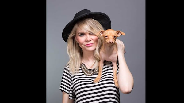 Courtney Dasher (left) poses with Tuna Melts My Heart (right) for a photo by Gerrard Gethings courtesy of Dasher. Tuna has more than 1.8 million followers on Instagram.