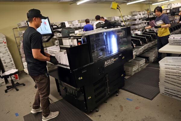 Ballots are scanned and sorted at San Francisco Department of Elections in City Hall in San Francisco on Wednesday, Nov. 6, 2024. (Scott Strazzante/San Francisco Chronicle via AP)