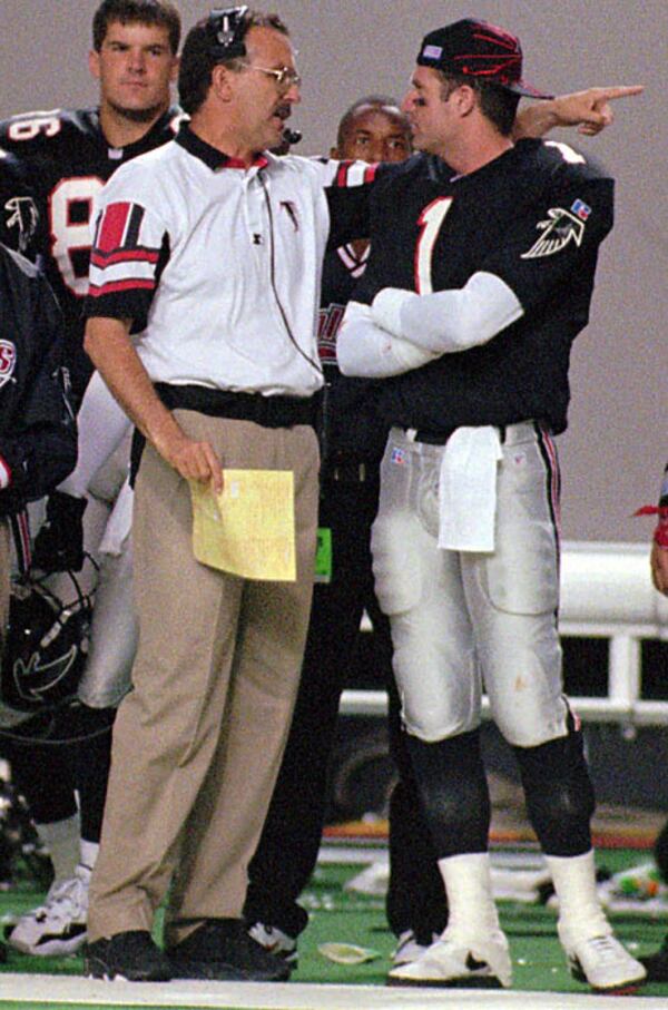 June Jones asks Jeff George to flip his lid. (AP)