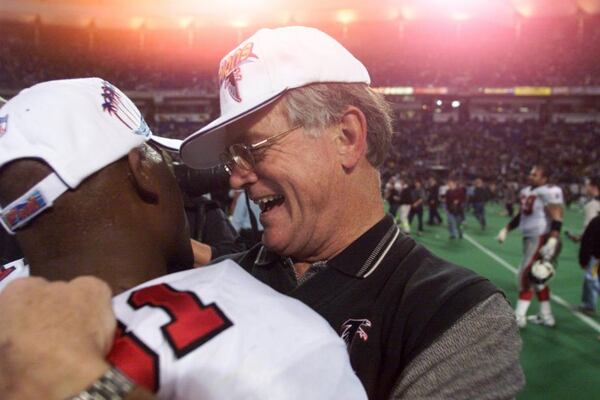  Dan Reeves and Mathis after defeating Minnesota in overtime in the 1998 NFC Championship Game.