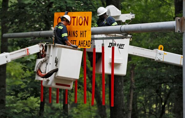 June 20, 2019 - Smyrna -  Cobb County is rolling out yet another tool designed to warn drivers of the seven-foot clearance of the Concord Road covered bridge. The county has installed mast arms along Concord Road that will have PVC pipes suspended seven feet above the road, or the same height as the bridge.  Bob Andres / bandres@ajc.com