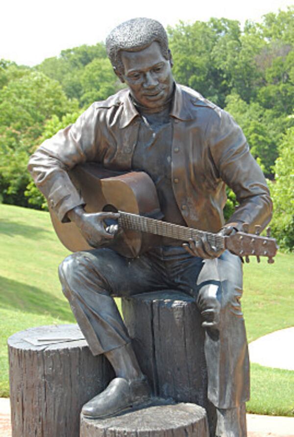 "Otis Redding Sittin' on the Dock of the Bay," created by artist Bradley Cooley and his son Bradley Cooley, Jr.