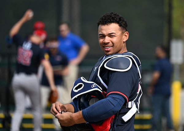 Atlanta Braves catcher Drake Baldwin reacts as he watches teammates during spring training workouts at CoolToday Park, Sunday, February 16, 2025, North Port, Florida. (Hyosub Shin / AJC)