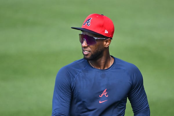 Atlanta Braves outfielder Jurickson Profar warms up on the baseball field during spring training workouts at CoolToday Park, Thursday, February 13, 2025, North Port, Florida. (Hyosub Shin / AJC)