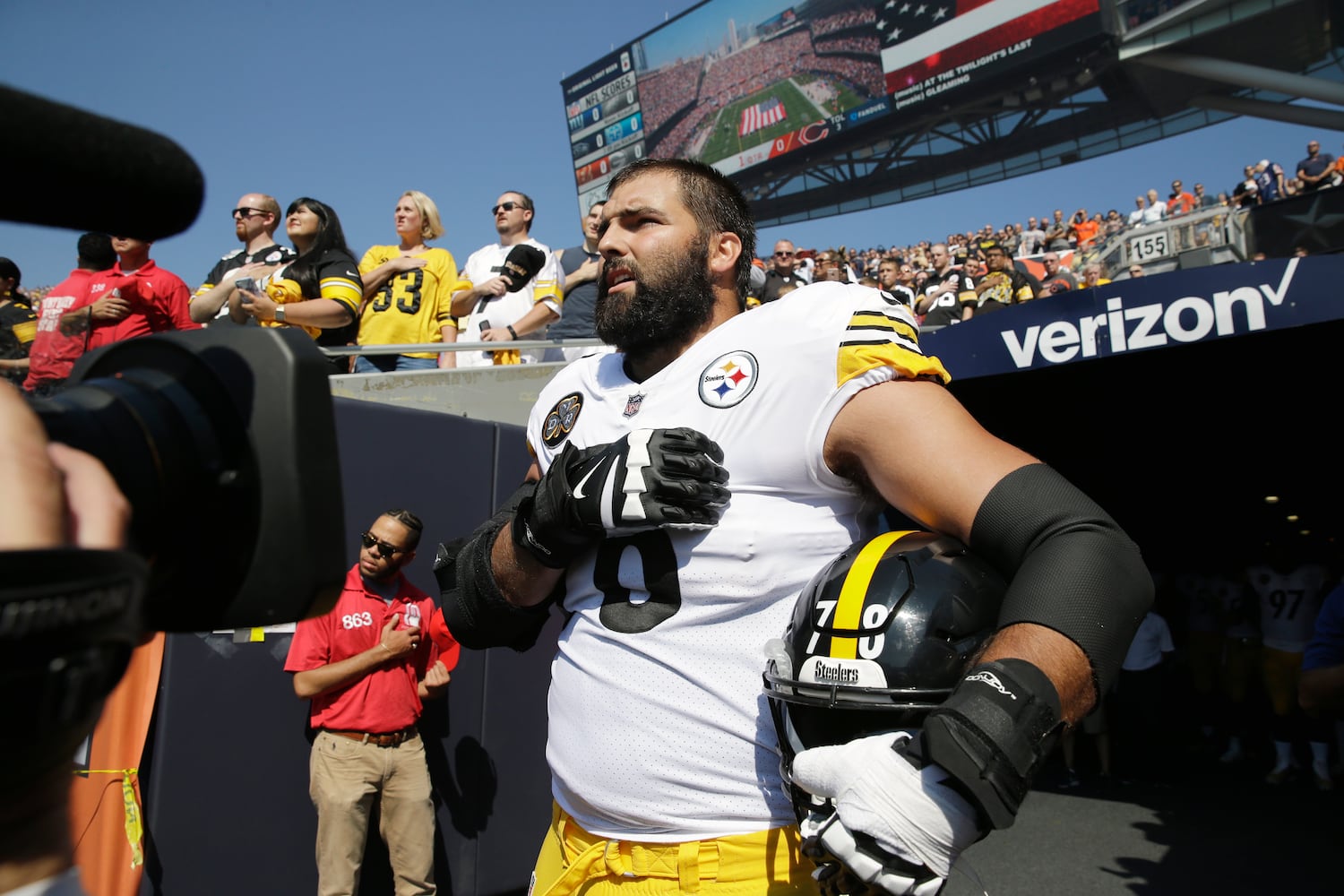 Photos: Falcons, other NFL teams show solidarity during National Anthem