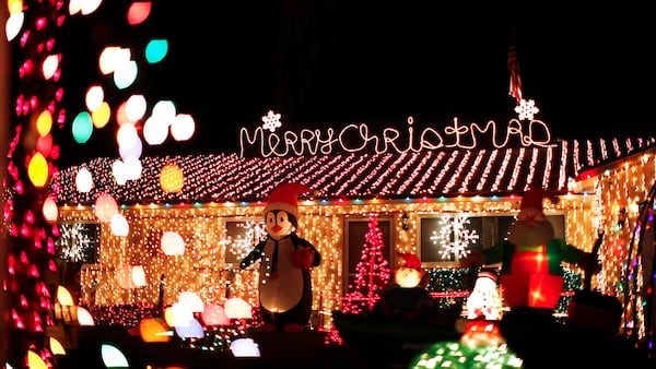 The Novak's home on Palm Way in Lake Worth is illuminated with holiday lights. (Palm Beach Post file photo)