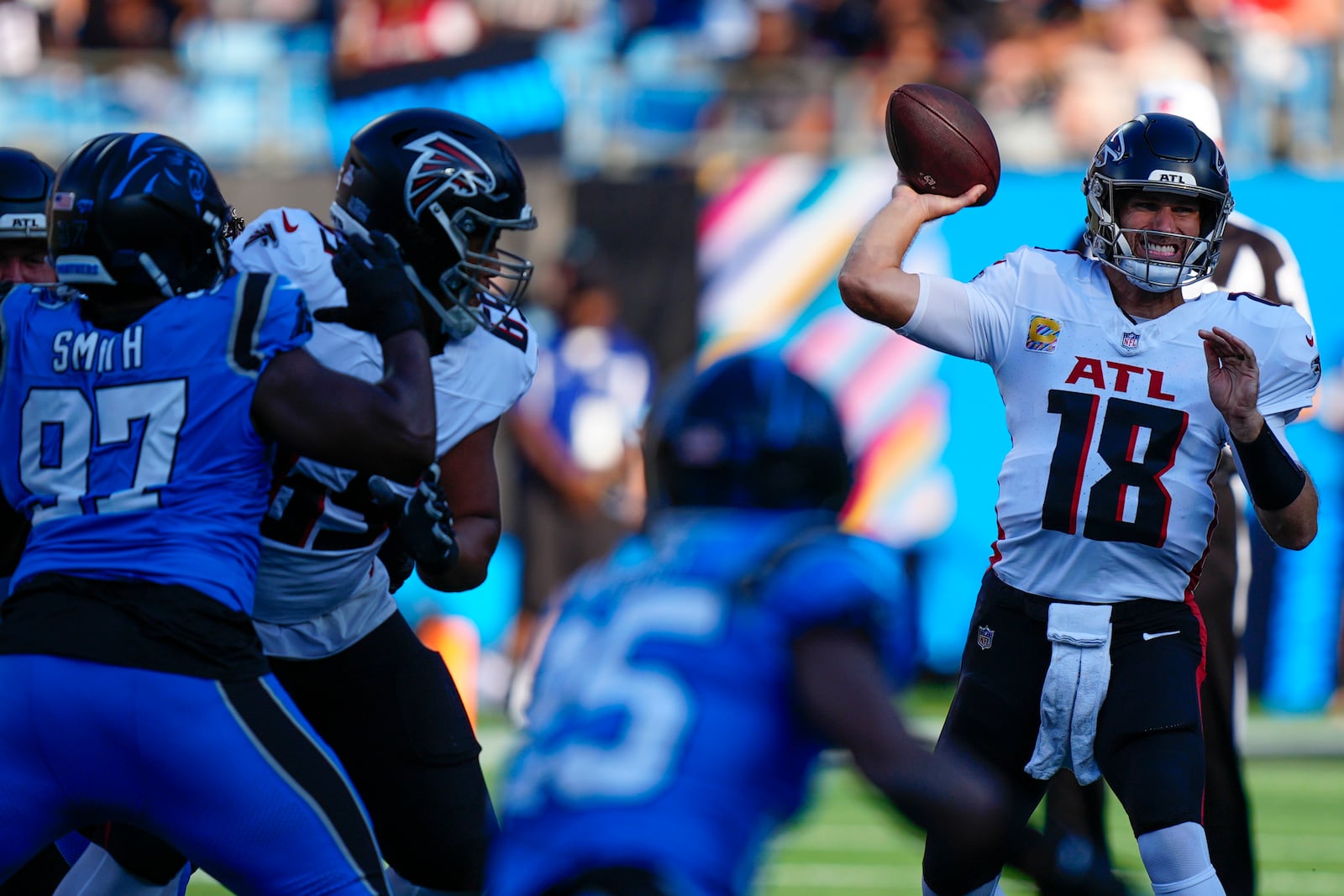 Atlanta Falcons wide receiver Rondale Moore (14) passes the ball in the first half of an NFL football game against the Carolina Panthers in Charlotte, N.C., Sunday, Oct. 13, 2024. (AP Photo/Jacob Kupferman)