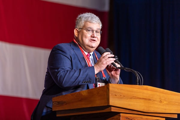 Outgoing Georgia GOP Chairman David Shafer introduces a speaker at the Georgia GOP convention in Columbus, Georgia on Friday, June 9, 2023. Before he left office as chairman of the state GOP in 2023, David Shafer pledged the party’s help in defraying the legal costs of the 16 electors who met in mid-December 2020 to cast votes as if Trump had won Georgia during his failed reelection bid. (Arvin Temkar/The Atlanta Journal-Constitution/TNS)