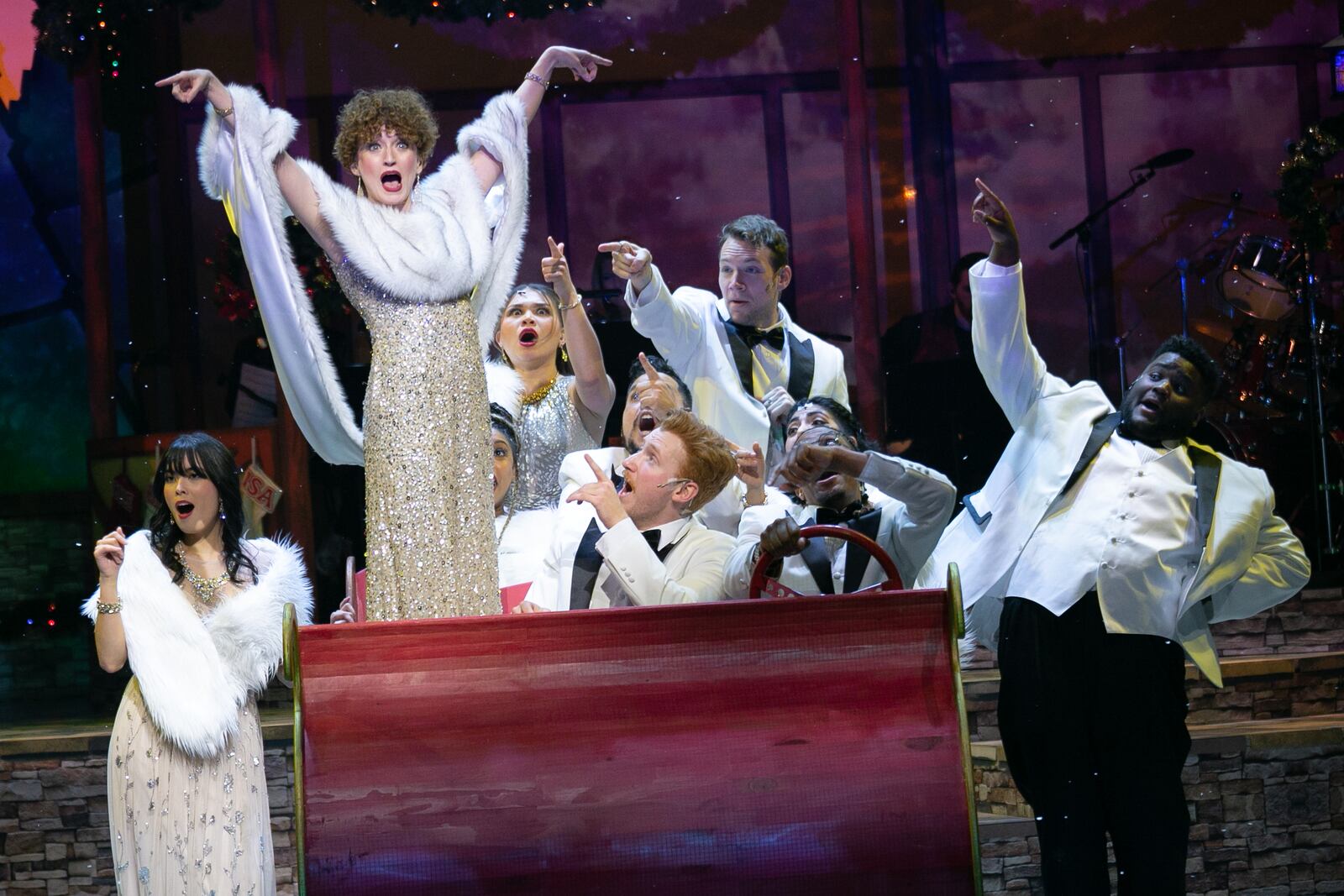 Aurora Theatre was one of six Fulton County arts organizations to receive grants from the Georgia Council for the Arts for fiscal 2025. Pictured here, Galen Crawley (top) and the cast of "Christmas Canteen" rouse the spirit at Aurora. 
Photo: Courtesy of the Aurora Theatre / Casey Gardner Ford