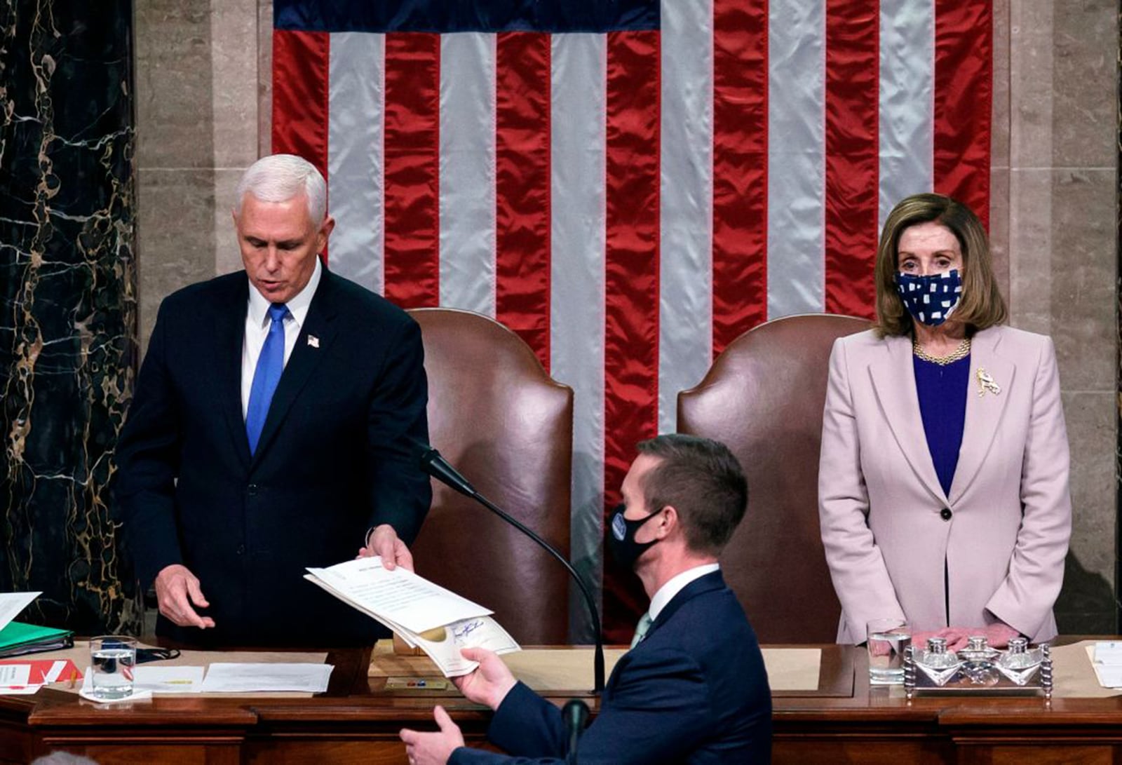 Vice President Mike Pence and House Speaker Nancy Pelosi preside over a joint session of Congress to certify the 2020 Electoral College results after supporters of President Donald Trump stormed the Capitol earlier in the day. Then-President Donald Trump and his allies pressed Pence to overturn the results by selecting alternate slates of electors from Georgia and other states, but the vice president refused. J. Scott Applewhite/POOL/AFP via Getty Images/TNS