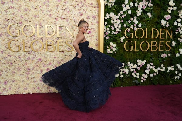 Kate Hudson arrives at the 82nd Golden Globes on Sunday, Jan. 5, 2025, at the Beverly Hilton in Beverly Hills, Calif. (Photo by Jordan Strauss/Invision/AP)