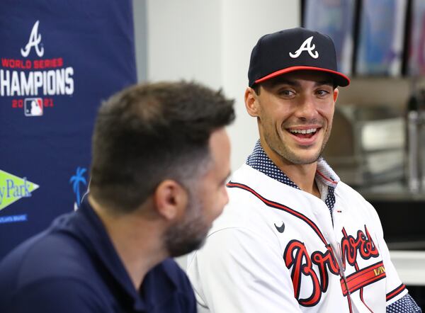 031522 North Port: Atlanta Braves newly acquired All-Star first baseman Matt Olson, signed to an eight-year, $168 million deal that runs through the 2029 season, is all smiles as he is introduced by Braves GM Alex Anthopoulos during his press conference at Spring Training in CoolToday Park on Tuesday, March 15, 2022, in North Port.    “Curtis Compton / Curtis.Compton@ajc.com”