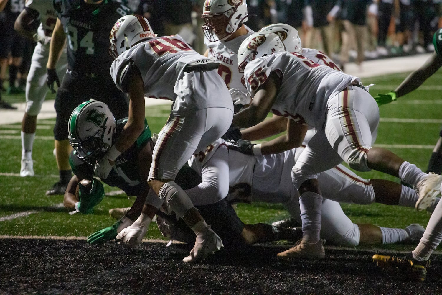 Marquis Willis, senior wide receiver for Roswell, runs the ball into the endzone during the Mill Creek vs. Roswell high school football game on Friday, November 27, 2020, at Roswell High School in Roswell, Georgia. Roswell defeated Mill Creek 28-27. CHRISTINA MATACOTTA FOR THE ATLANTA JOURNAL-CONSTITUTION