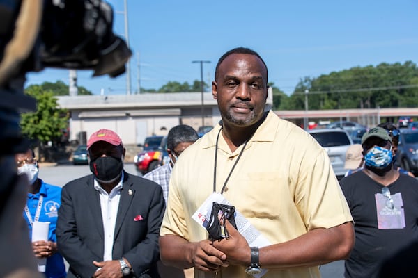 Mitchell Taylor, the vice president of the Atlanta Metro Area Local APW union, speaks about the current morale of U.S. Postal Service clerks during a press conference Tuesday. (ALYSSA POINTER / ALYSSA.POINTER@AJC.COM)