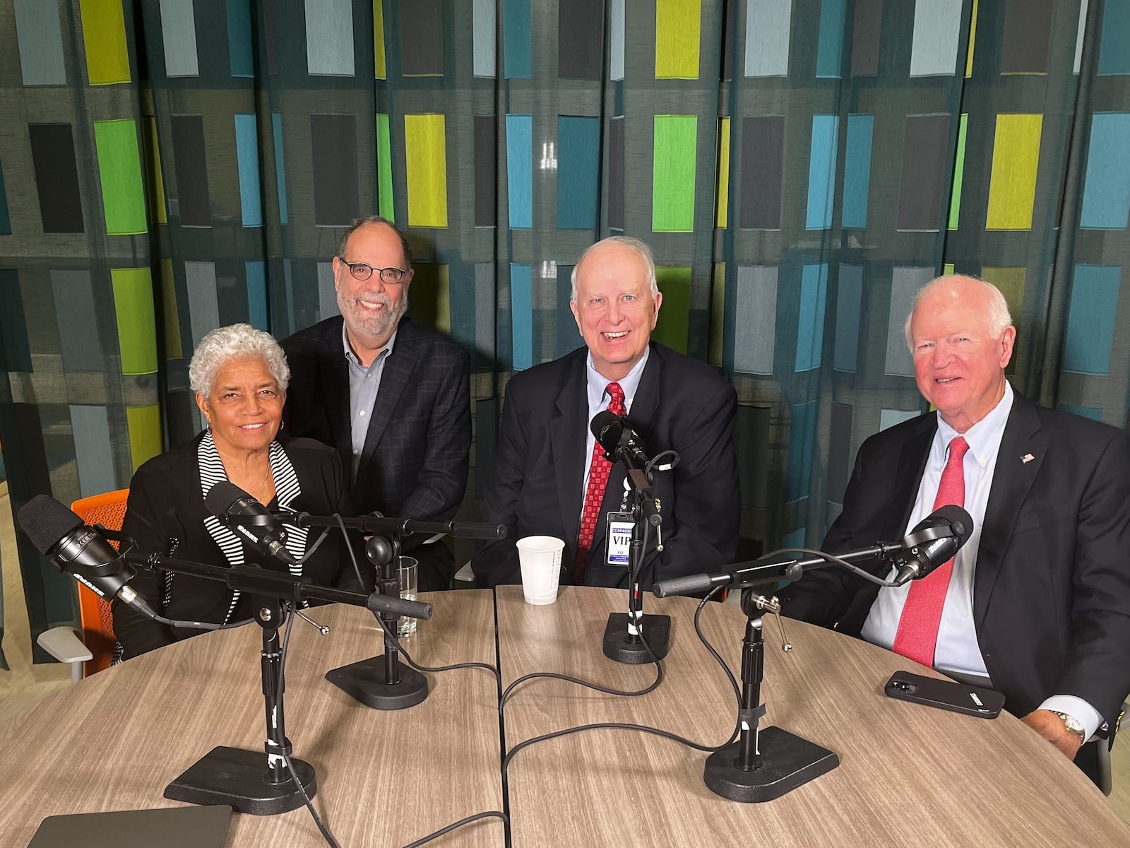 Bill Nigut (second from left) talked to former Atlanta Mayor Shirley Franklin, former Gov. Roy Barnes (center) and former U.S. Sen. Saxby Chambliss (right) about their work on the Democracy Defense project.