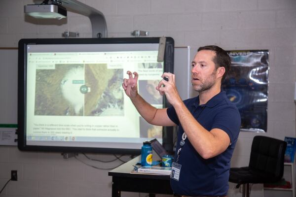 A few days after school started at Samuel M. Inman Middle School in Atlanta, science teacher Spence Ford talks to his students about the death of Okjokull, the glacier in Iceland which was memorialized on Aug. 18 as the first glacier in the country lost to climate change. STEVE SCHAEFER / SPECIAL TO THE AJC