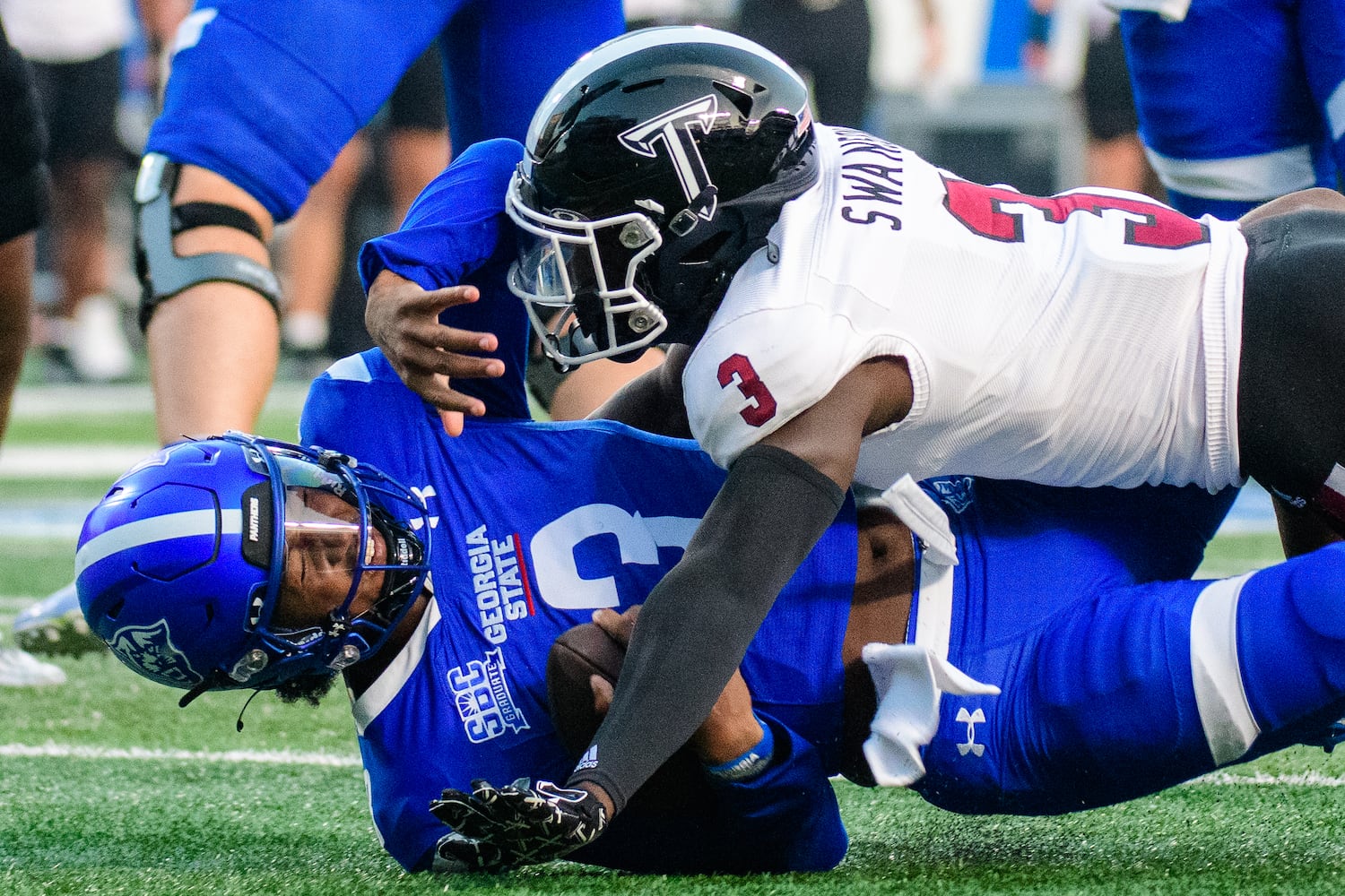 GSU's Gavin Pringle is tackled during the GSU v Troy football game Saturday, September 30, 2023 (Jamie Spaar for the Atlanta Journal Constitution)