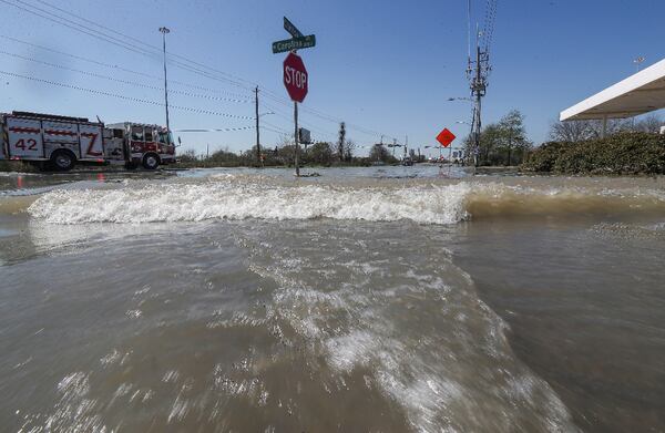 The flooding submerged vehicles on an eastern section of Loop 610, a highway that circles Houston.