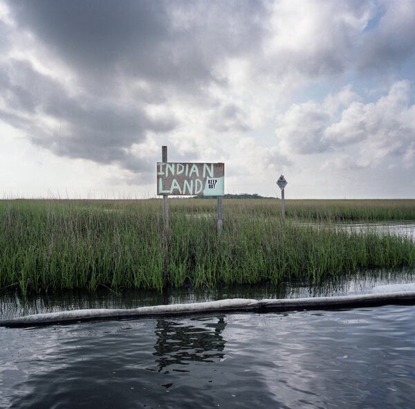 "Stranded Indian Land with Oil Boom, after the British Petroleum Oil Spill," 2010, by Kael Alford.
Contributed by Kael Alford / Panos Pictures / High Museum of Art