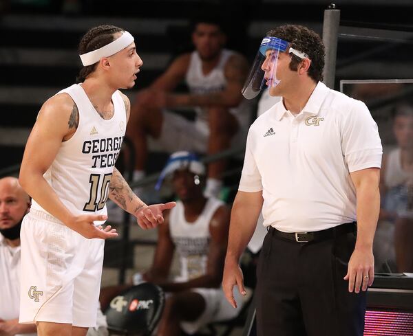 Georgia Tech guard Jose Alvarado confers with head coach Josh Pastner during the season opener loss against Georgia State in a NCAA college basketball game in Atlanta on Wednesday, Nov 25, 2020, in Atlanta.  “Curtis Compton / Curtis.Compton@ajc.com”