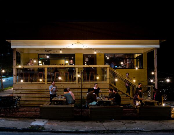 The patio at A Mano, shown on a bustling Wednesday night in early fall, contributes to the restaurant’s welcoming atmosphere. CONTRIBUTED BY HENRI HOLLIS