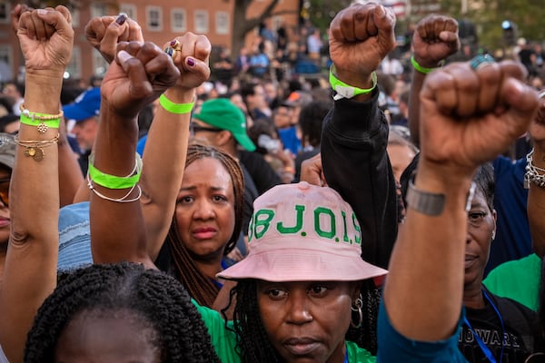 FILE - Supporters of Democratic presidential nominee Vice President Kamala Harris hold up their fists in the air in unison after she delivered a concession speech after the 2024 presidential election, Nov. 6, 2024, on the campus of Howard University in Washington. (AP Photo/Jacquelyn Martin, File)