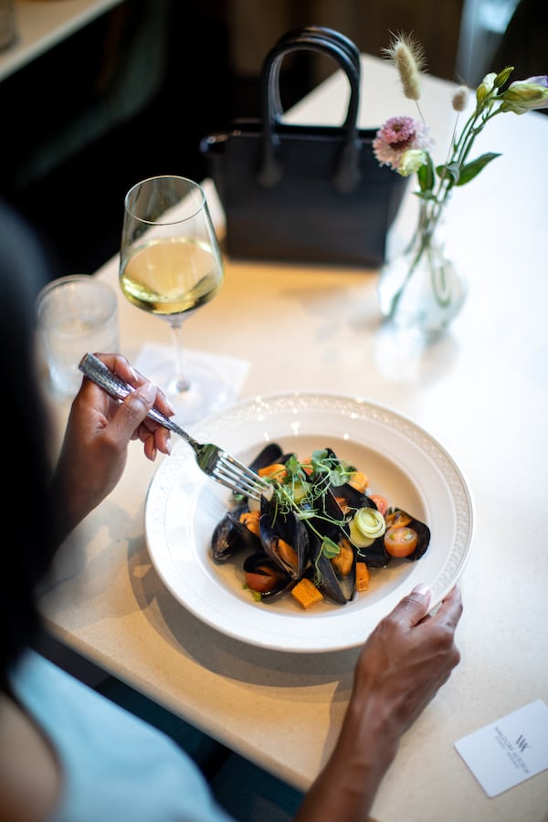 The whiskey-steamed mussels with preserved lemon that reviewer Henri Hollis was served at Brassica were spoiled. Courtesy of Waldorf Astoria Atlanta Buckhead