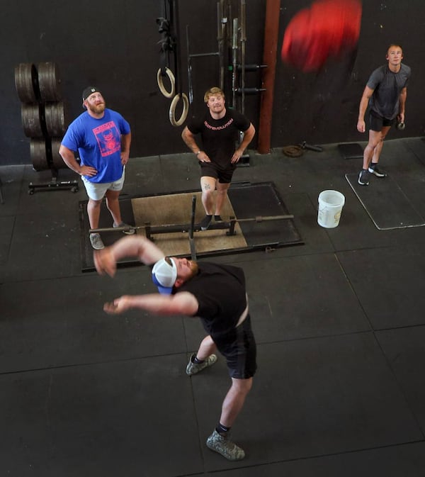 Trotter Barringer, front and center, the recent winner of his weight class at this year’s Georgia’s Strongest Man competition, trains at Body Evolution in Columbus, Georgia for the upcoming national competition. (Photo Courtesy of Mike Haskey)