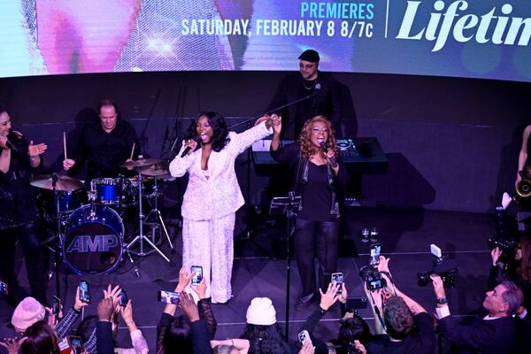 (l. to r.) Joaquina Kalukango performs with singer Gloria Gaynor.