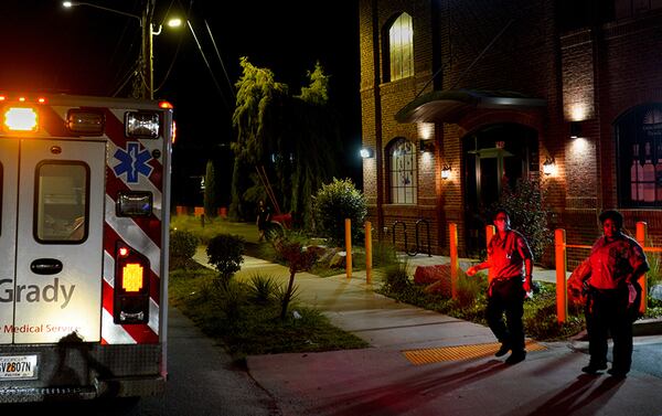 Grady EMS personnel leave the scene of a fatal shooting on West Marietta Street in Atlanta early Saturday, August 13, 2022. One man was pronounced dead at the scene, and Atlanta police are investigating. (Photo: Ben Hendren for The Atlanta Journal-Constitution)