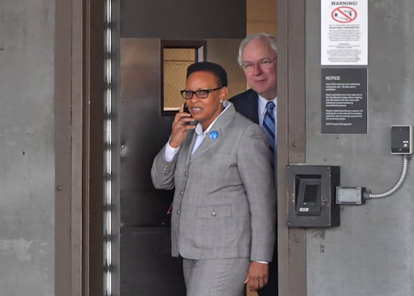 April 5, 2018 Atlanta - Rev. Mitzi Bickers and her attorney Richard Hendrix the Richard B. Russell Federal Building after her first appearance in federal court on Thursday, April 5, 2018. Rev. Mitzi Bickers made her first appearance in federal court Thursday to face charges that she took $2 million in bribes to steer city of Atlanta contracts to at least two contractors from 2010 to 2015. She was released on a $50,000 appearance bond. HYOSUB SHIN / HSHIN@AJC.COM