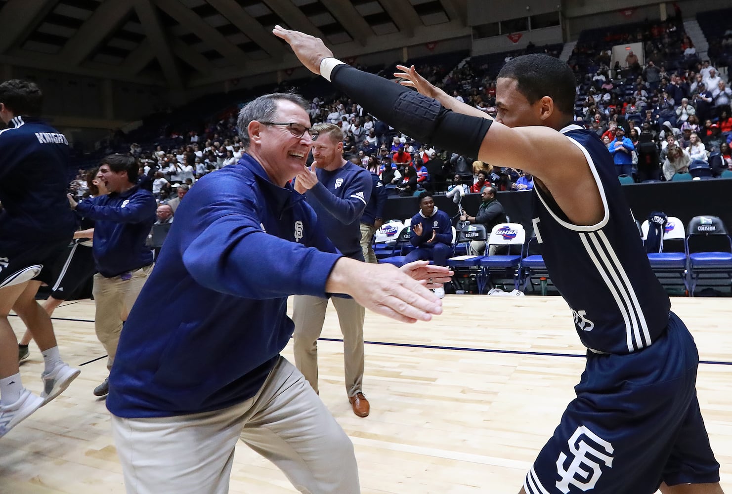 Photos: High school basketball teams sew up state titles