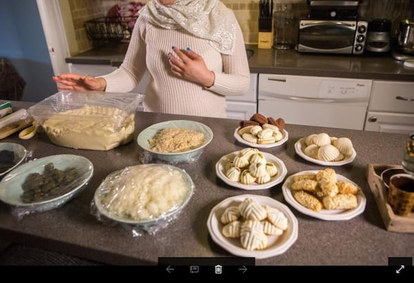 With the help of a GoFundMe page, Ruwaida, a Syrian refugee, is renting space in a commercial kitchen to help her get a cookie business up and running. Photo: PHIL SKINNER