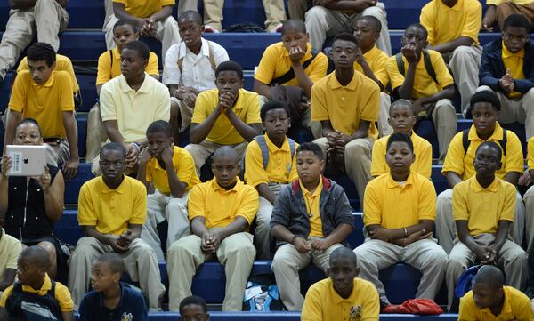 August 7, 2013 - Atlanta: Young men sit and listen to former Atlanta Mayor and United Nations Ambassador Andrew Young speak on the first day of school at B.E.S.T Academy (Business Engineering Science Technology) on Wednesday, August 7 ,2013. Over 80 members of the 100 Black Men of Atlanta greeted the boys and their parents as they arrived at school. The boys were inspired by Young to become leaders in the community. Young spoke to boys in the middle school and high School. The school is an all male school. Today was the first day back to school for students in Atlanta.JOHNNY CRAWFORD / JCRAWFORD@AJC.COm Volunteers from 100 Black Men of Atlanta have spent time in the schools including B.E.S.T Academy (Business Engineering Science Technology). JOHNNY CRAWFORD / JCRAWFORD@AJC.COM