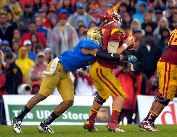 UCLA linebacker Anthony Barr, left, sacks Southern California quarterback Matt Barkley during the second half of their NCAA college football game, Saturday, Nov. 17, 2012, in Pasadena, Calif. UCLA won 38-28. (AP Photo/Mark J. Terrill) UCLA linebacker Anthony Barr, left, sacks Southern California quarterback Matt Barkley during the second half of their NCAA college football game, Saturday, Nov. 17, 2012, in Pasadena, Calif. UCLA won 38-28. (AP Photo/Mark J. Terrill)