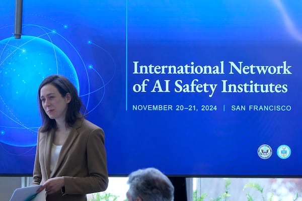 Elizabeth Kelly, Director of the U.S. AI Safety Institute, listens to speakers at the convening of the International Network of AI Safety Institutes at the Golden Gate Club at the Presidio in San Francisco, Wednesday, Nov. 20, 2024. (AP Photo/Jeff Chiu)