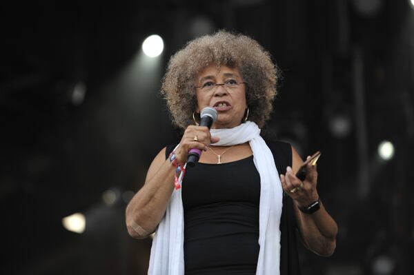 Angela Davis speaks at the Many Rivers to Cross Music and Arts Festival in Fairburn on Oct. 1, 2016. Social justice was one of the festival’s themes. DAVID BARNES / SPECIAL TO AJC