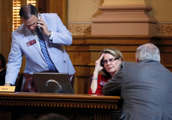 House Speaker Pro Tem Jan Jones waits for a late afternoon Rules Committee meeting to begin. It's the panel that decides what legislation will get a floor vote. BOB ANDRES  /BANDRES@AJC.COM