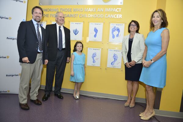 (L-R) Dr. Doug Graham, Director of Aflac Cancer Center; Scott Slade, Honoree; Ellanor Young, Leukemia patient; Dorothy Jordan, Honoree Kathelen Amos, President Aflac Foundation CREDIT: AFLAC