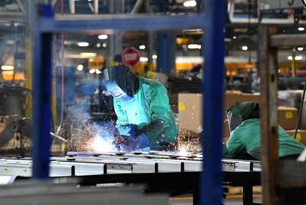 Workers at a Blue Bird electric vehicle factory in Fort Valley, Ga., voted Friday to join the United Steelworkers union. (Hyosub Shin/The Atlanta Journal-Constitution)