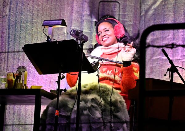 Jeanette Illidge co-stars in the Alliance Theatre's interactive drive-in production of "A Christmas Carol: The Live Radio Play," performed from the Summerhill parking lot of Georgia State University's Center Parc Credit Union Stadium.  
Courtesy of Greg Mooney